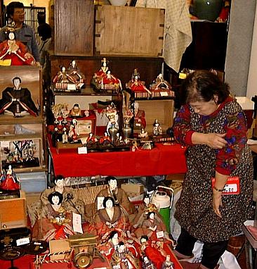 Fair Vendor Selling Dolls