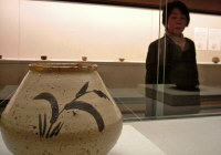 E-garatsu jar with lady looking