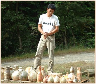 Tsujimura Kai Looking Over His Pots Tsujimura Kai Looking Over His Pots